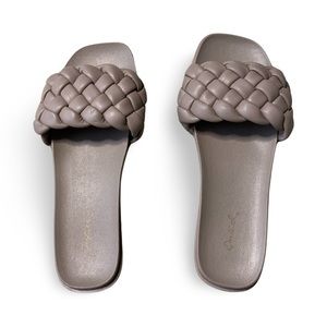 New sandal. Minor flaws on left sandal. See photo. Slight indentations on braid